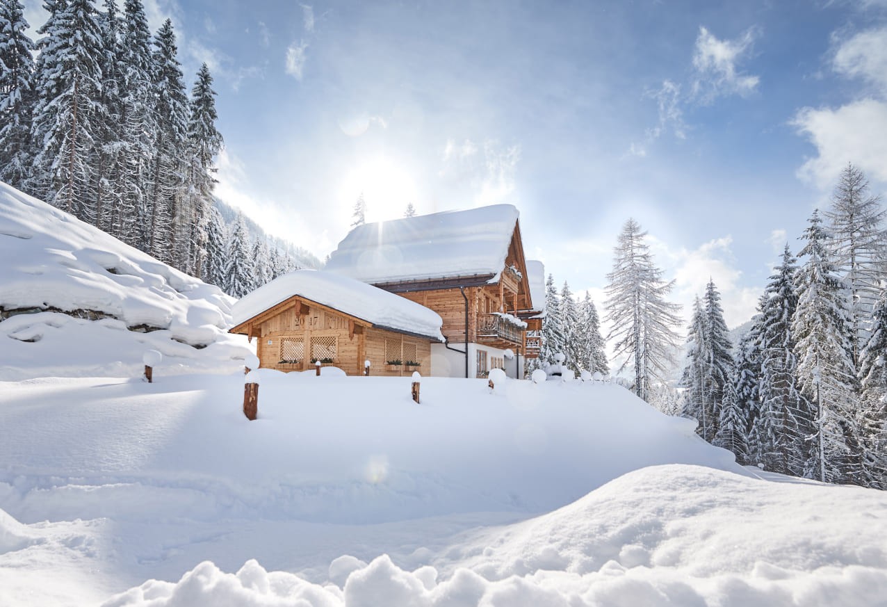 Winteransicht der Chalets Almidylle in St. Martin am Tennengebirge